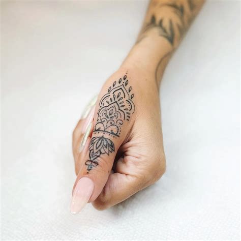 beautiful hand tattoos for ladies